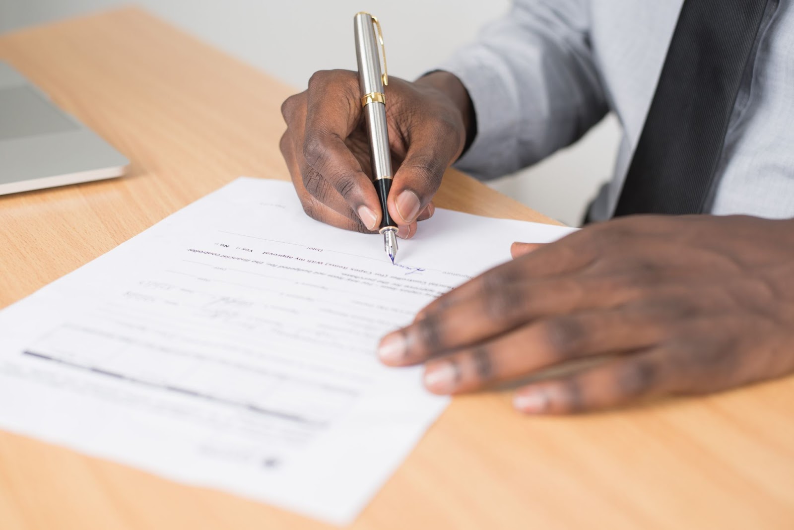 A client signing a mortgage